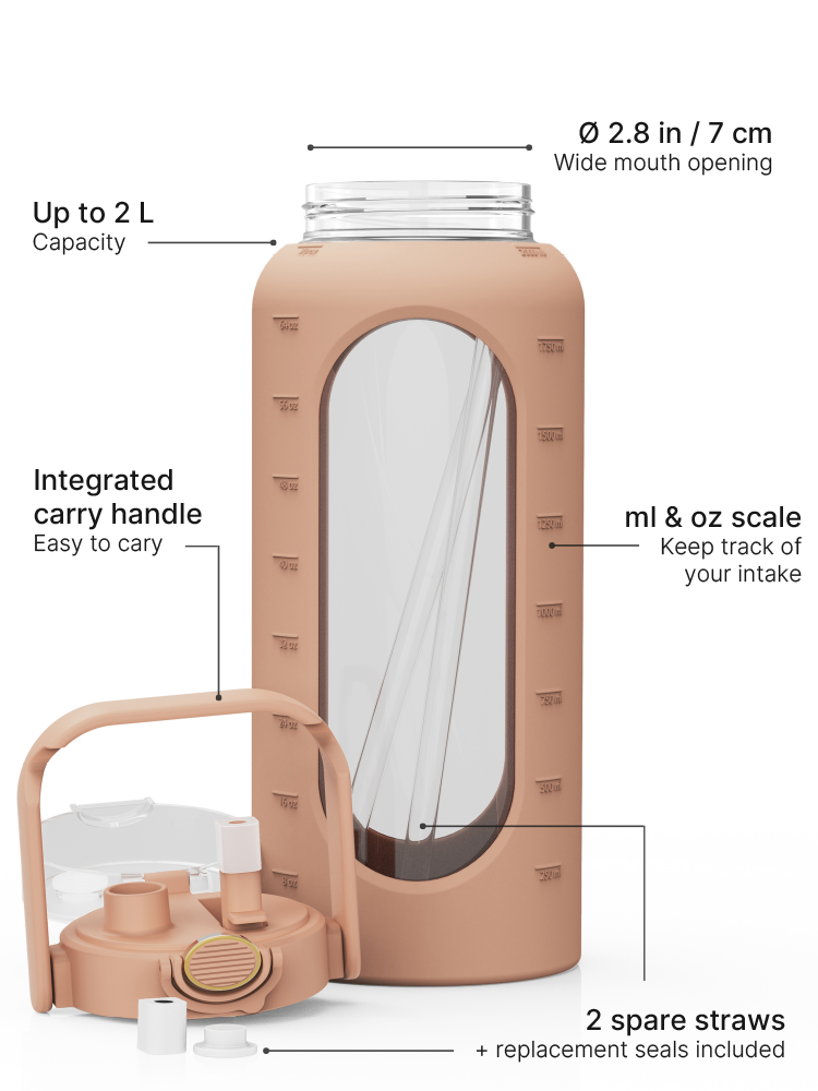 Brown 2-liter glass water bottle with silicone sleeve, carry handle, straw lid, measurement scale, replacement seals and two spare straws.