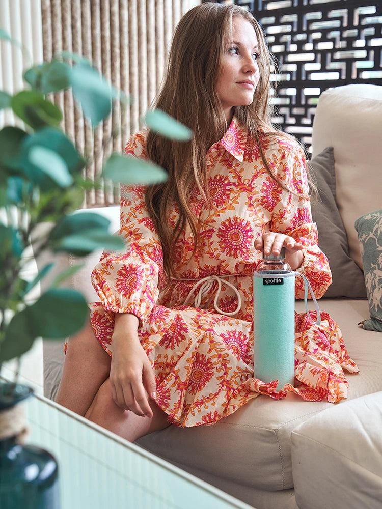 glasflasche-550-ml-mit-neopren-huelle-turquoise #color_turquoise